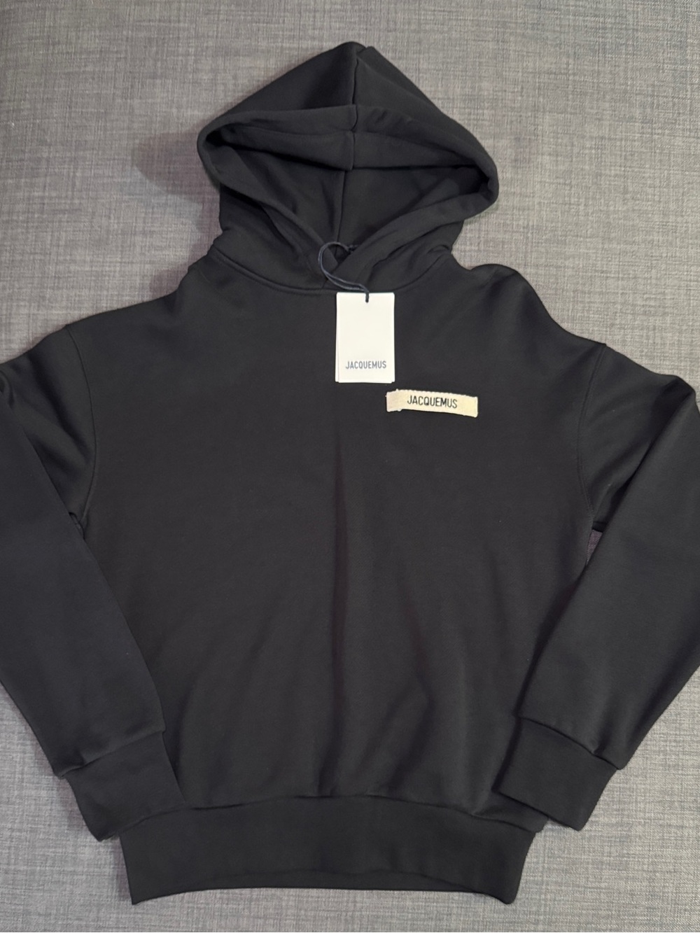 Jacquemus Black Hoodie with Cream Logo Patch